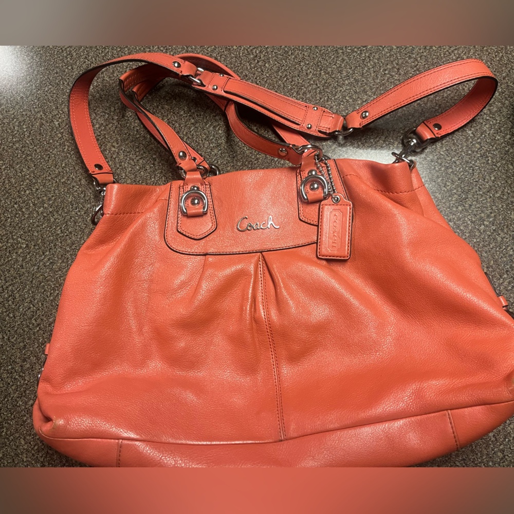 Loved tangerine Coach handbag